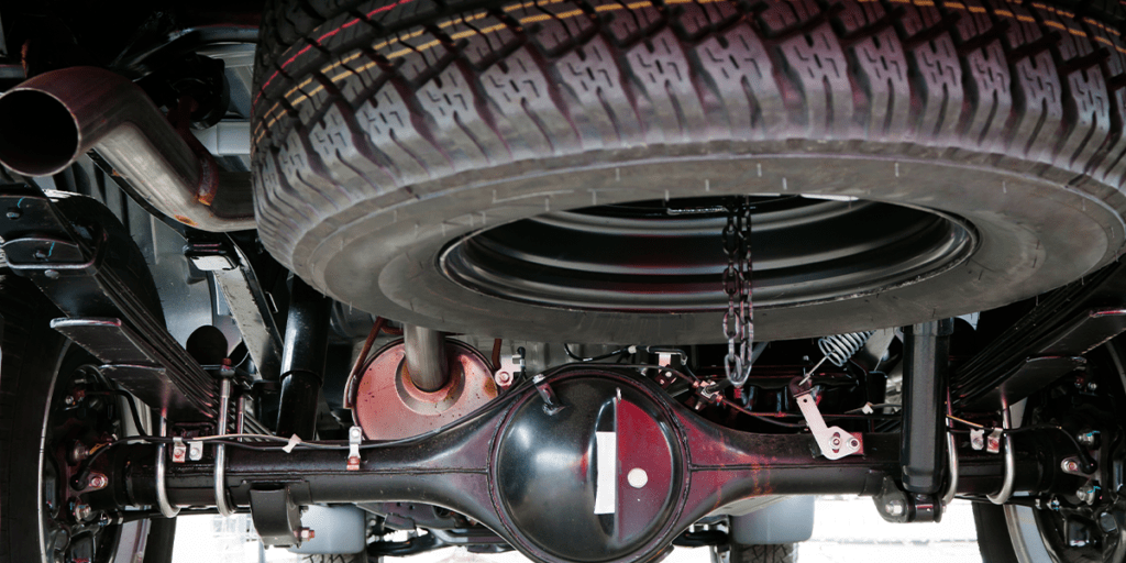 spare tire beneath car