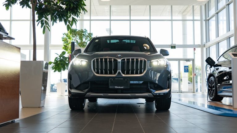 front view of 2026 bmw x1 sitting in showroom