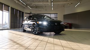 black 2026 honda civic hatchback in service bay