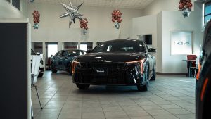 black kia k4 in showroom