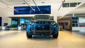 full front view of 2026 defender OCTA in showroom