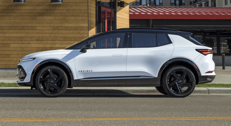 white chevrolet equinox ev parked on street