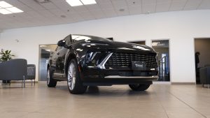 black 2026 buick envision parked in showroom