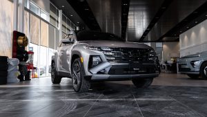 Silver 2026 Hyundai Tucson parked in bright showroom